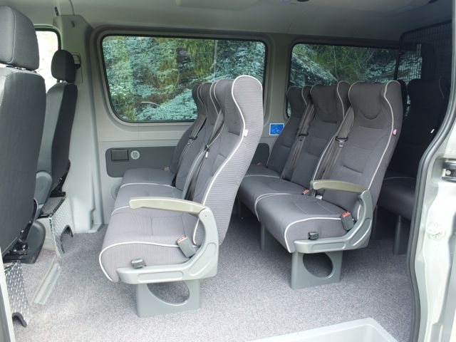 Empty passenger seats inside a van
