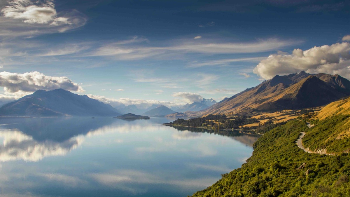Lake Wakatipu reflecting the sky beside the Glenorchy road